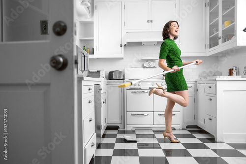 Fotografie, Obraz Happy fun dancing housewife housekeeping kitchen clean immaculate joyful pleasan
