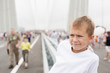 © Stanislav Komogorov - Boy stands on a Golden Bridge in Vladivostok