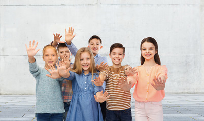 Canvas Print - happy children waving hands