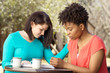 © pixelheadphoto - Woman praying for each other