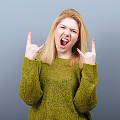 Portrait of young girl showing 