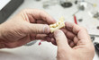 © Andy Dean - Male Dental Technician Working On A 3D Printed Mold For Tooth Implants In The Lab.