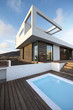© ADDICTIVE STOCK - Backyard pool at luxury modern design home
