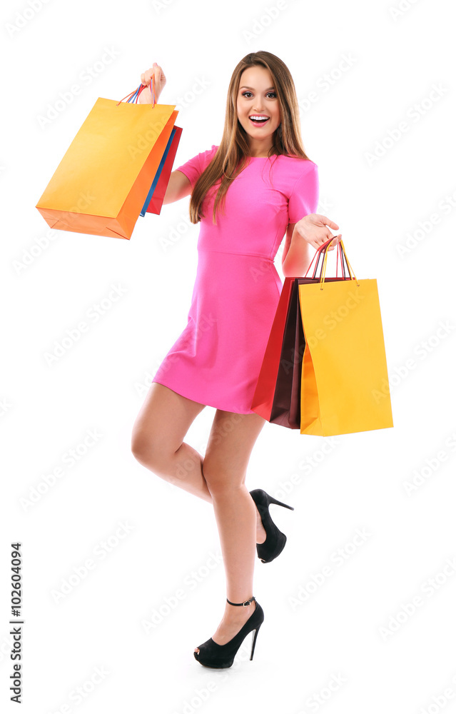 Young pretty woman with shopping packages isolated on white
