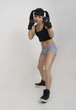 © sandyche - female boxer, fitness woman boxing wearing boxing black gloves