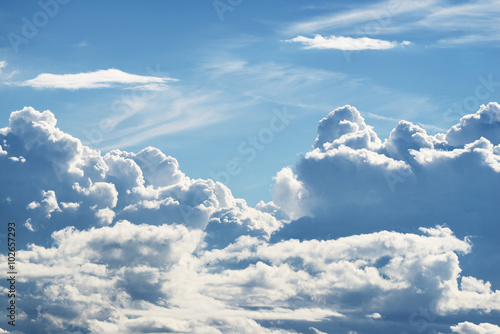 Naklejka ścienna Cloudscape with ornamental clouds