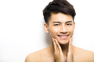 Closeup portrait of attractive young man face