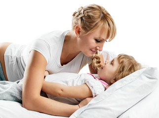 playful mother and daughter