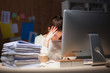 © shefkate - Young and beautiful businesswoman tired from work in the office