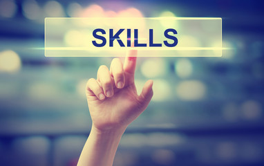Wall Mural - skills concept with hand pressing a button