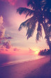 Beautiful tropical beach with silhouettes of palm trees at sunse
