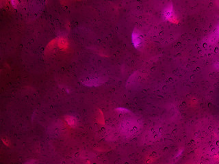 Wall Mural - Romantic violet pink soft red bokeh and water drop on glass mirr