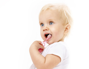 little child baby brushing teeth