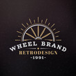 Wooden Wheel. Vintage Retro Design Elements for Logotype, Insignia, Badge, Label. Business Sign Template. Textured Background