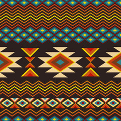 Ethnic seamless pattern on a dark background, vector illustration