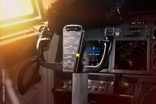 Papel de parede Modern jet airliner with glass cockpit at sunset