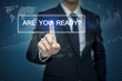 © tonefotografia - Businessman hand touching ARE YOU READY? button on virtual scree