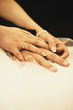 © Studio Migafka - Hands of bride and groom