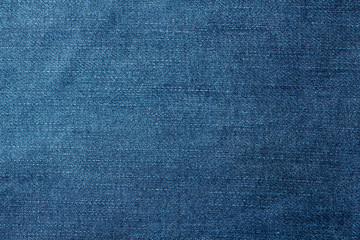 Denim fabric texture ideal for background, closeup of jeans