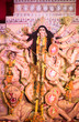 © Tukaram karve - MUMBAI, INDIA - October 20, 2015: An idol of revered goddess Durga standing in the temporary temple in the city of Mumbai during Durga Puja festival celebration.