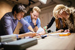 © NDABCREATIVITY - Team working on project together