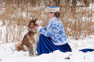 Wall Mural - Young russian woman with dog