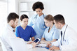 © Syda Productions - group of doctors with tablet pc at hospital
