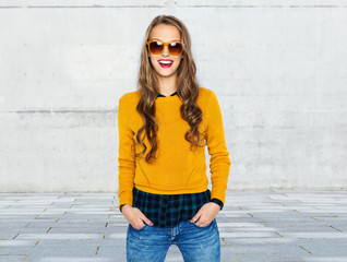 Wall Mural - happy young woman or teen girl in casual clothes