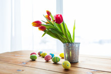 Close Up Of Easter Eggs And Flowers In Bucket