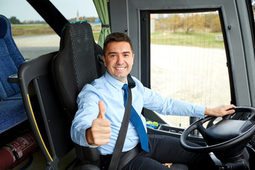 Wall Mural - happy driver driving bus and snowing thumbs up