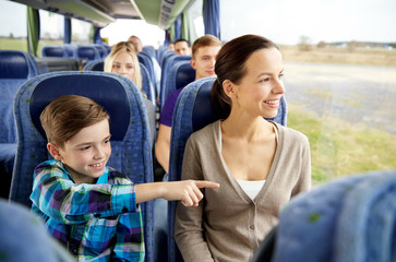 Canvas Print - happy family riding in travel bus