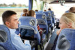 © Syda Productions - group of happy passengers in travel bus