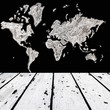 white wooden floor and map of the world on black chalk board front