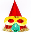 Purim. Clown's cap red With a funny mask