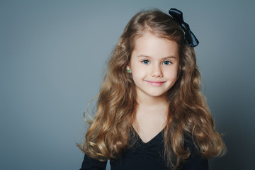 pretty young girl with black bow-knot