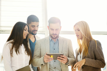 Wall Mural - Group of business people discussing