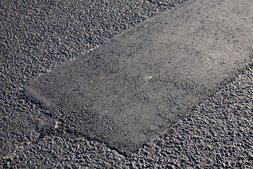 asphalt on concrete black patch