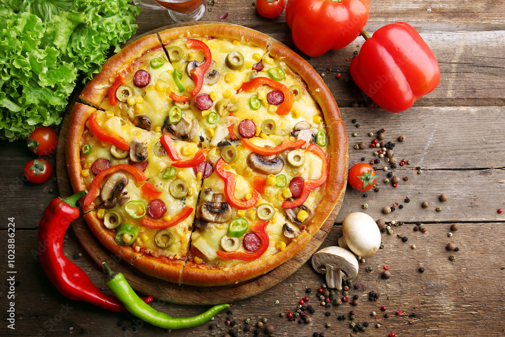 Delicious sliced pizza with vegetables, close-up