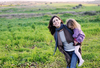 Sticker - outdoor portrait of a beautiful middle aged mother and daughter