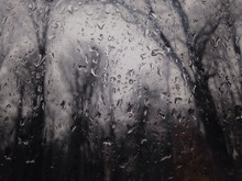 Raindrops At Window In Winter
