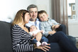 © Louis-Paul Photo - happy family mother, father and two children at home