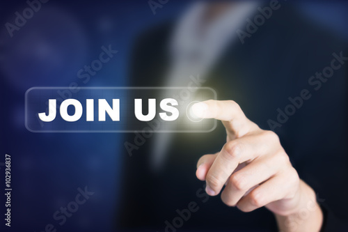 Fotografía Businessman pressing a JOIN US concept button