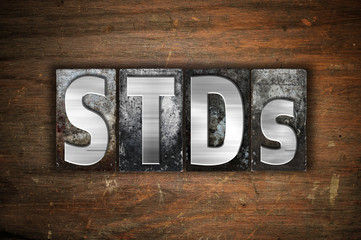 Wall Mural - STDs Concept Metal Letterpress Type