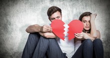 Composite Image Of Young Couple Holding Broken Heart