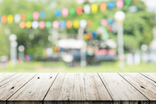 Empty Wooden Table With Blurred Party On Background