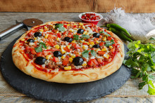 Pizza With Minced Meat Tomato Cheese Corn Olives 