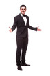 © F8  \ Suport Ukraine - Cheerful young man in suit welcome sign and smiling while standing against white background.Showman concept.