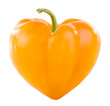 Yellow pepper in heart shape isolated on white