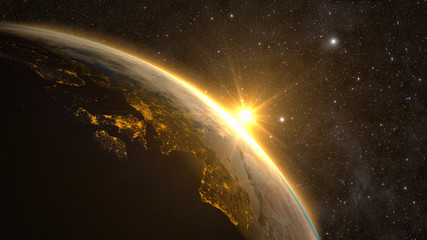 planet earth with a spectacular sunrise, view on europe and africa.