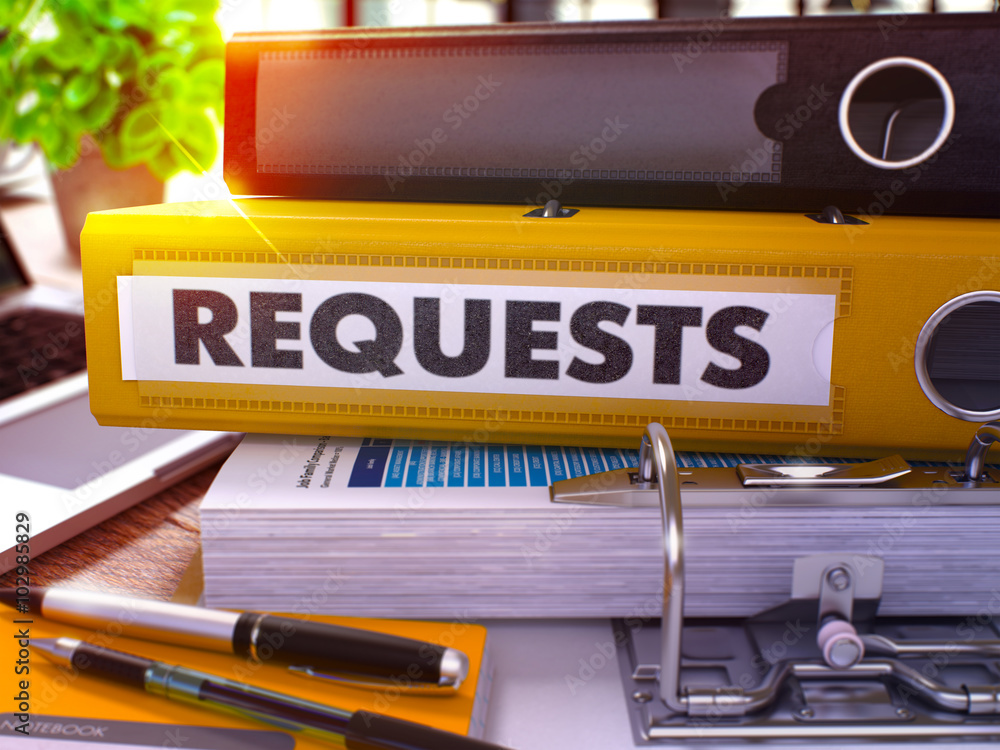Requests - Yellow Ring Binder on Office Desktop with Office Supplies ...